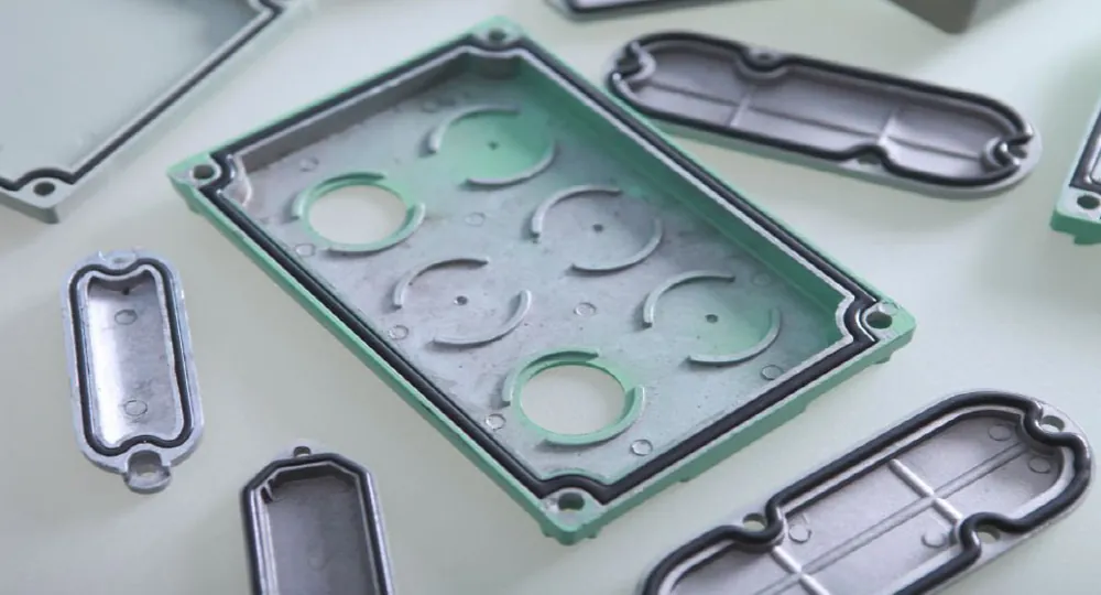 Fabricated metal parts with gaskets